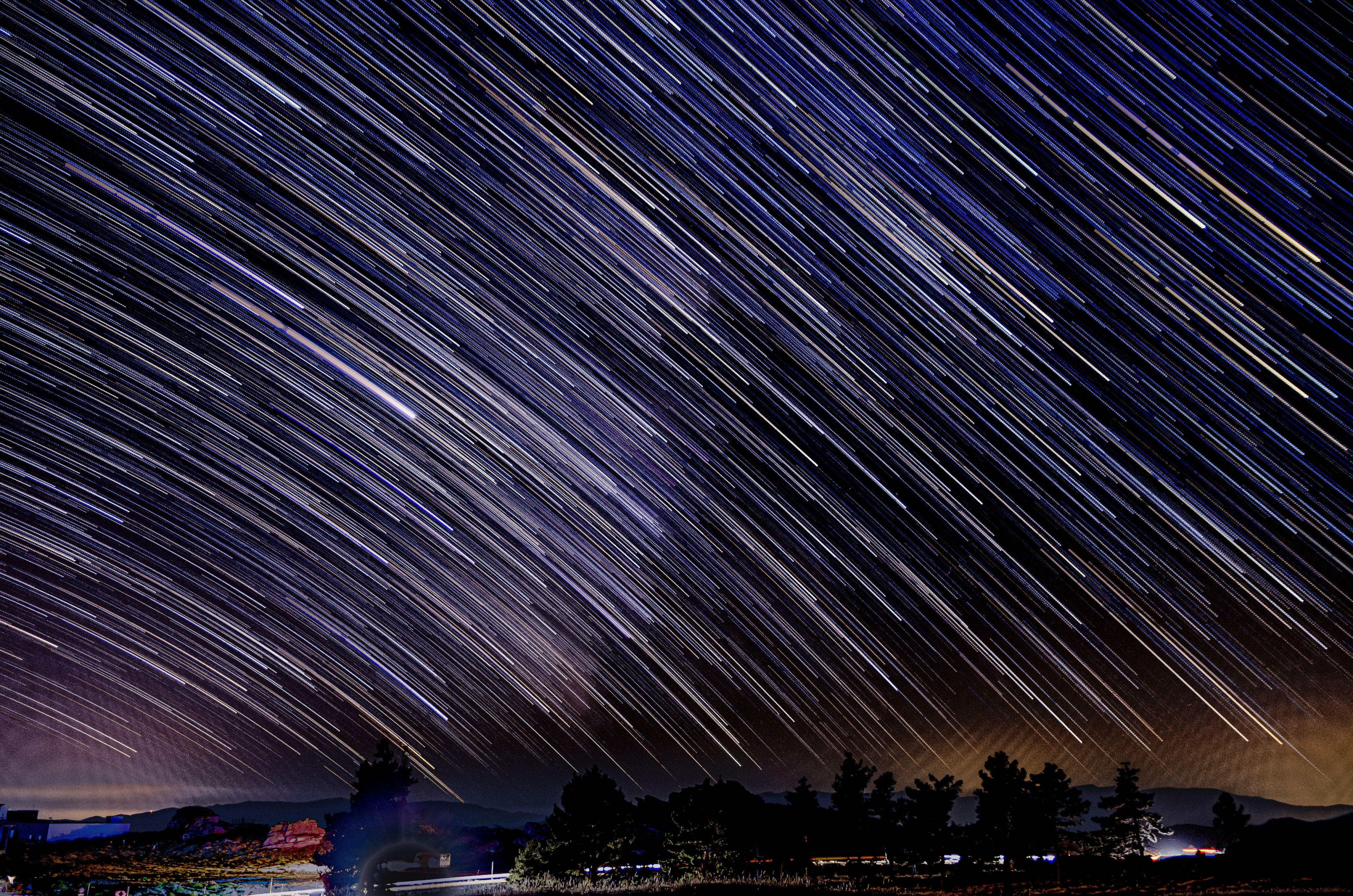 time lapse photography of city lights during night time